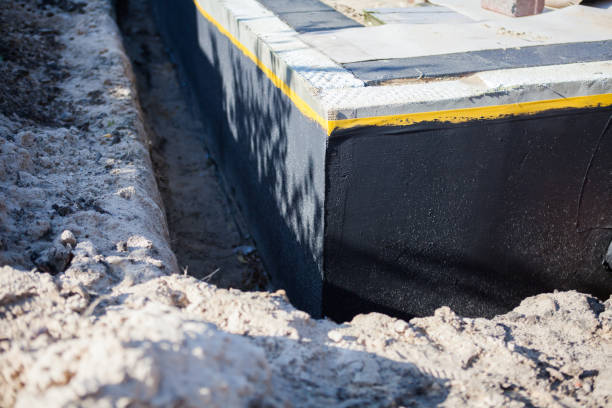 Professional Emergency Waterproofing technician working in Bellevue, OH